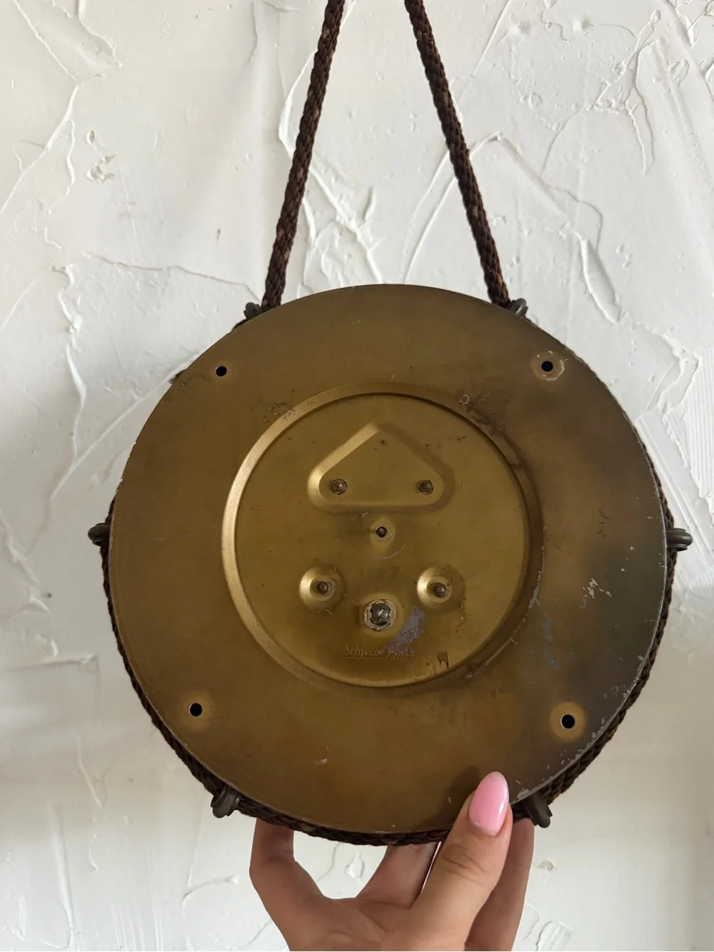vintage mid-century Diehl brass hanging wall clock featuring a distinctive braid